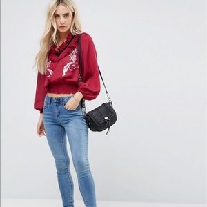 ASOS Petite ruffle neck blouse with embroidery